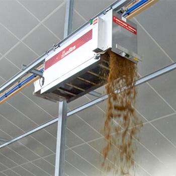 Automatic distribution of feeding and bedding materials