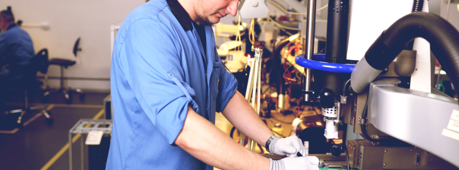 Engineer repairing and analysing PCBAs