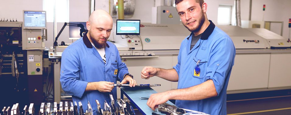 SMT operators loading component feeders