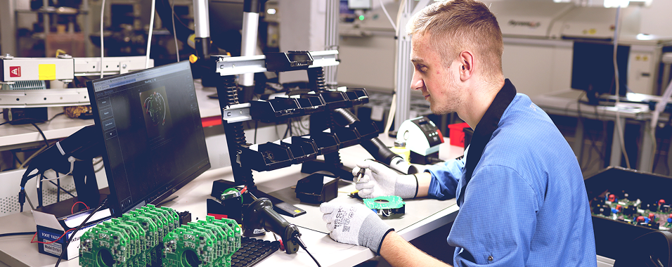 THD operator soldering components at EKTOS